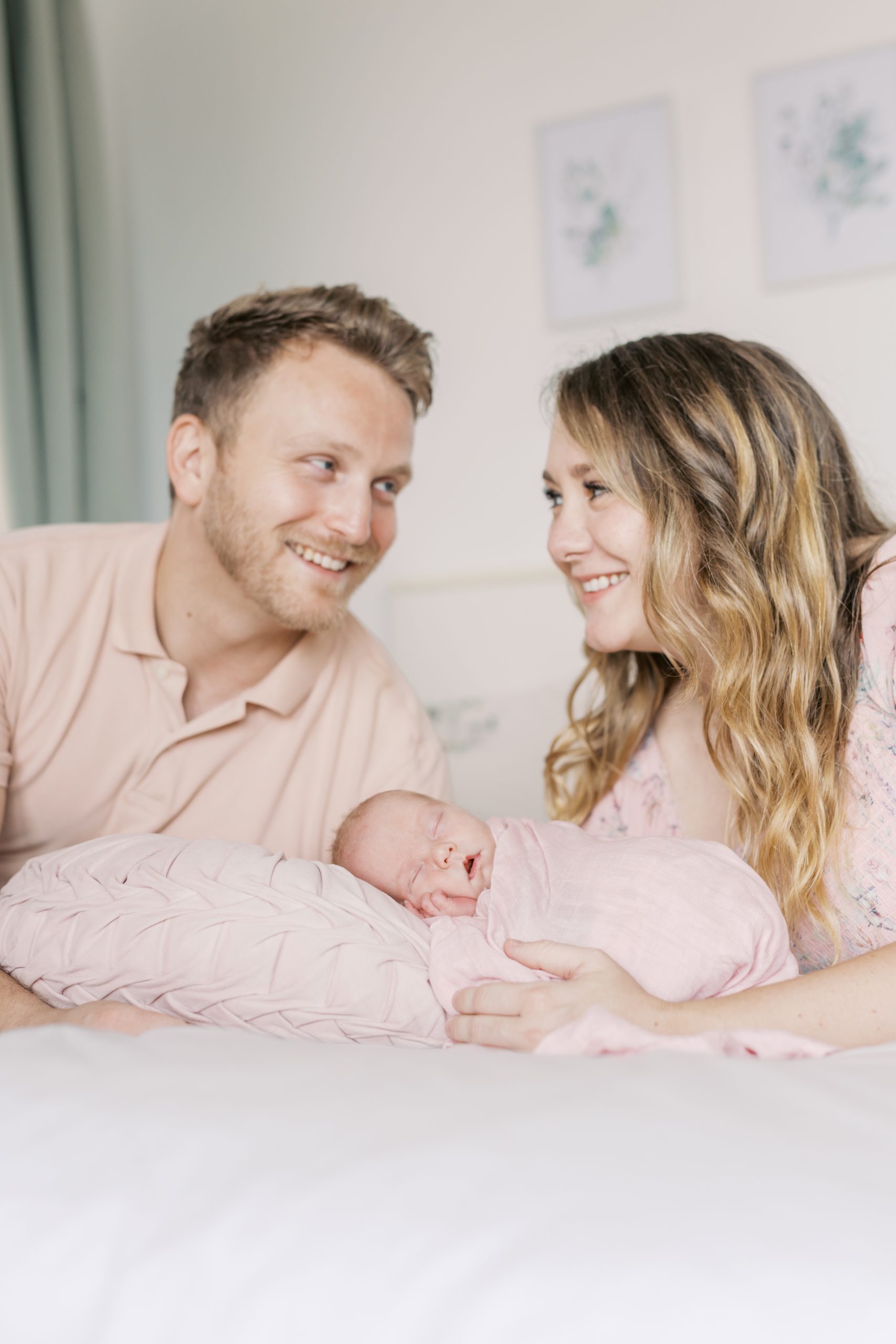 Hong Kong lifestyle newborn photographer documents parents and baby in their home during a relaxed family session